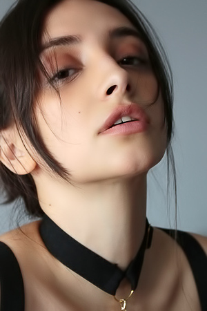 Olivia Linz Her Passionate Gaze Conveying Her Erotic Thoughts